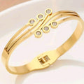 Synthetic Cubic Zirconia Round Dot Design Bangle / Stainless Steel.