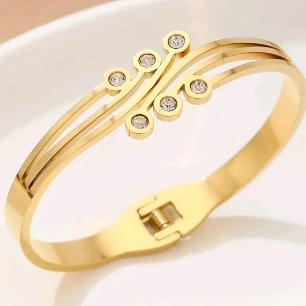 Synthetic Cubic Zirconia Round Dot Design Bangle / Stainless Steel.