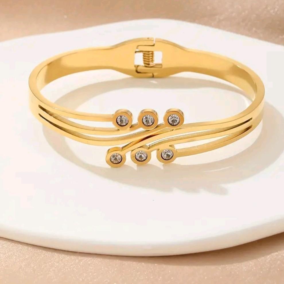 Synthetic Cubic Zirconia Round Dot Design Bangle / Stainless Steel.