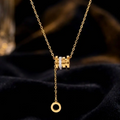 Elegant Triple-Ring Gold Necklace