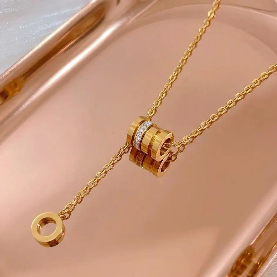Elegant Triple-Ring Gold Necklace